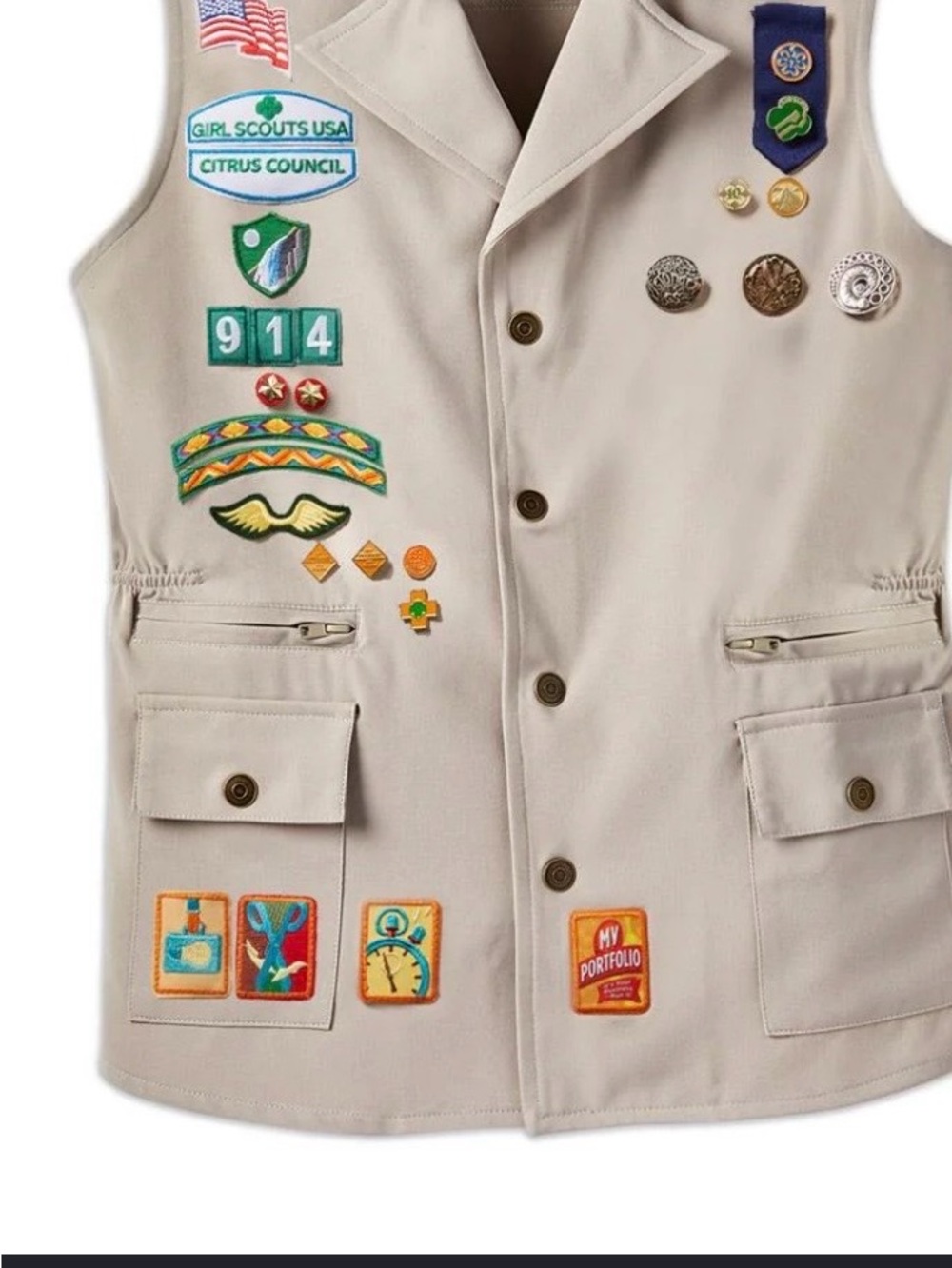 Girl Scouts Tan Vest with Merit Badge Patches